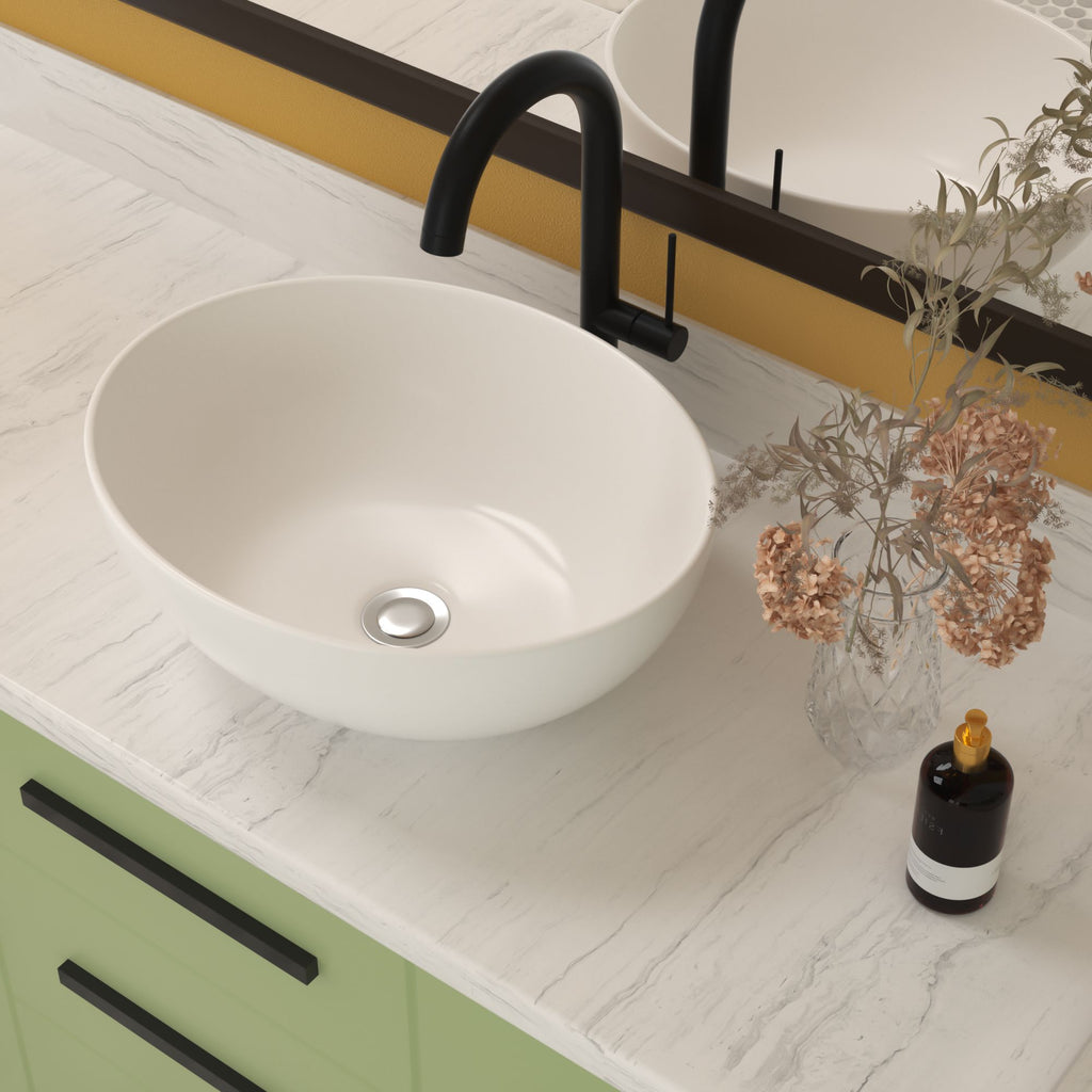 White Oval Vessel Sink with a Polished Profile