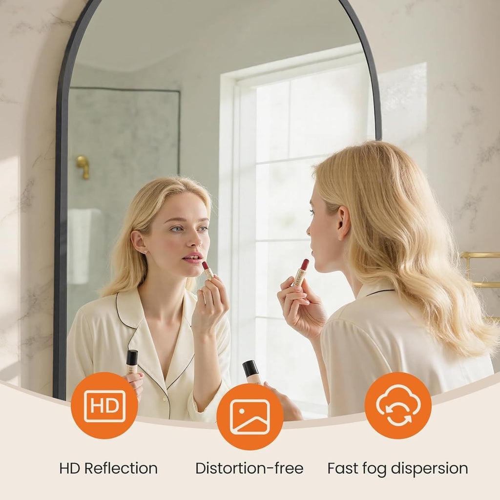 Arched Black Wall Mirror with Vintage-Inspired Character