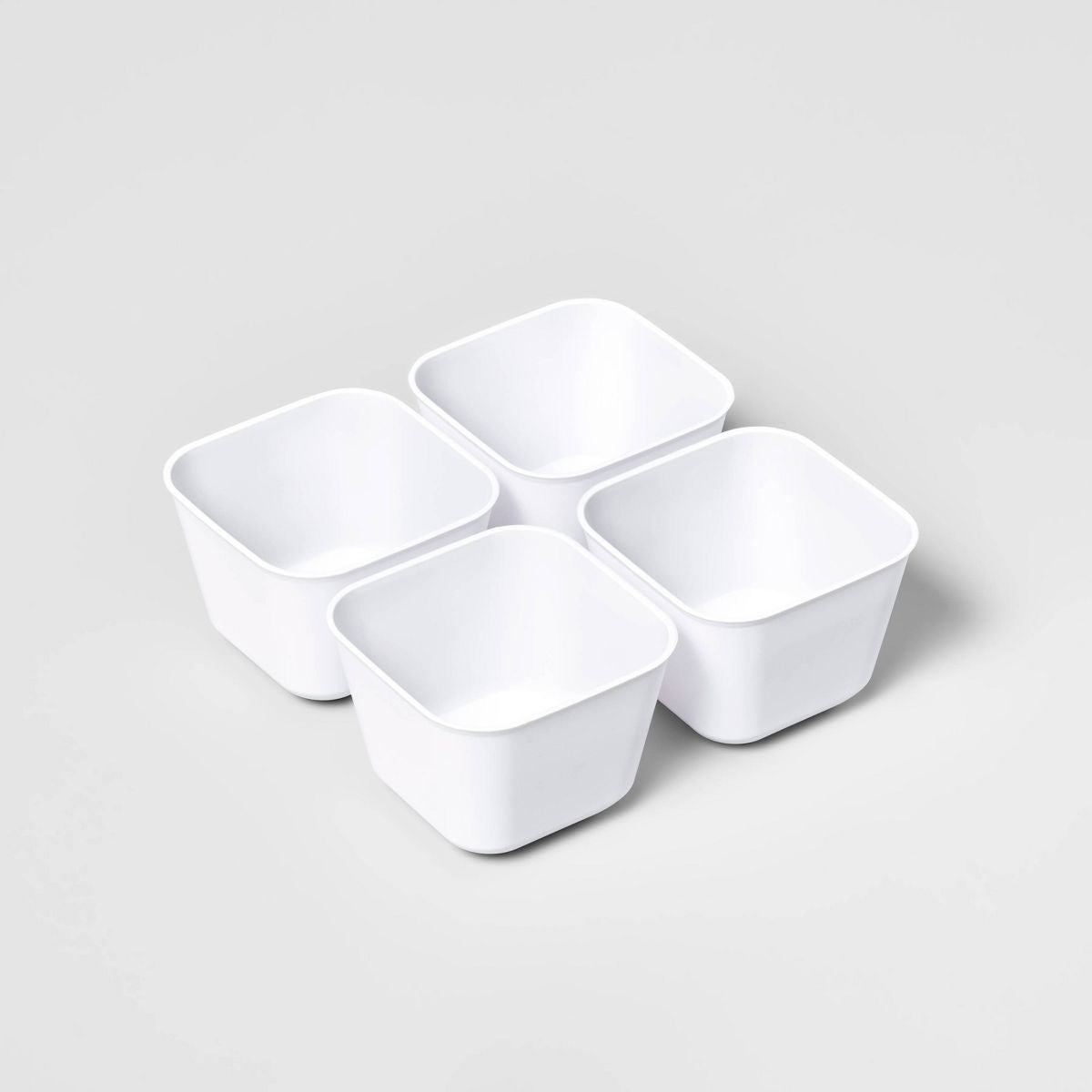 Four White Trays for Small-Item Organization