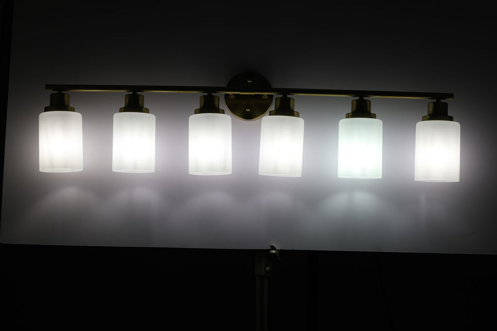 Golden Six-Light Vanity Fixture with Frosted Shades