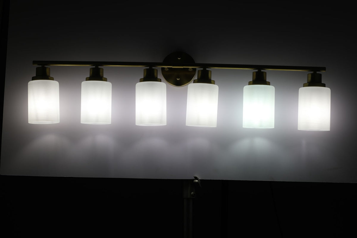 Golden Six-Light Vanity Fixture with Frosted Shades
