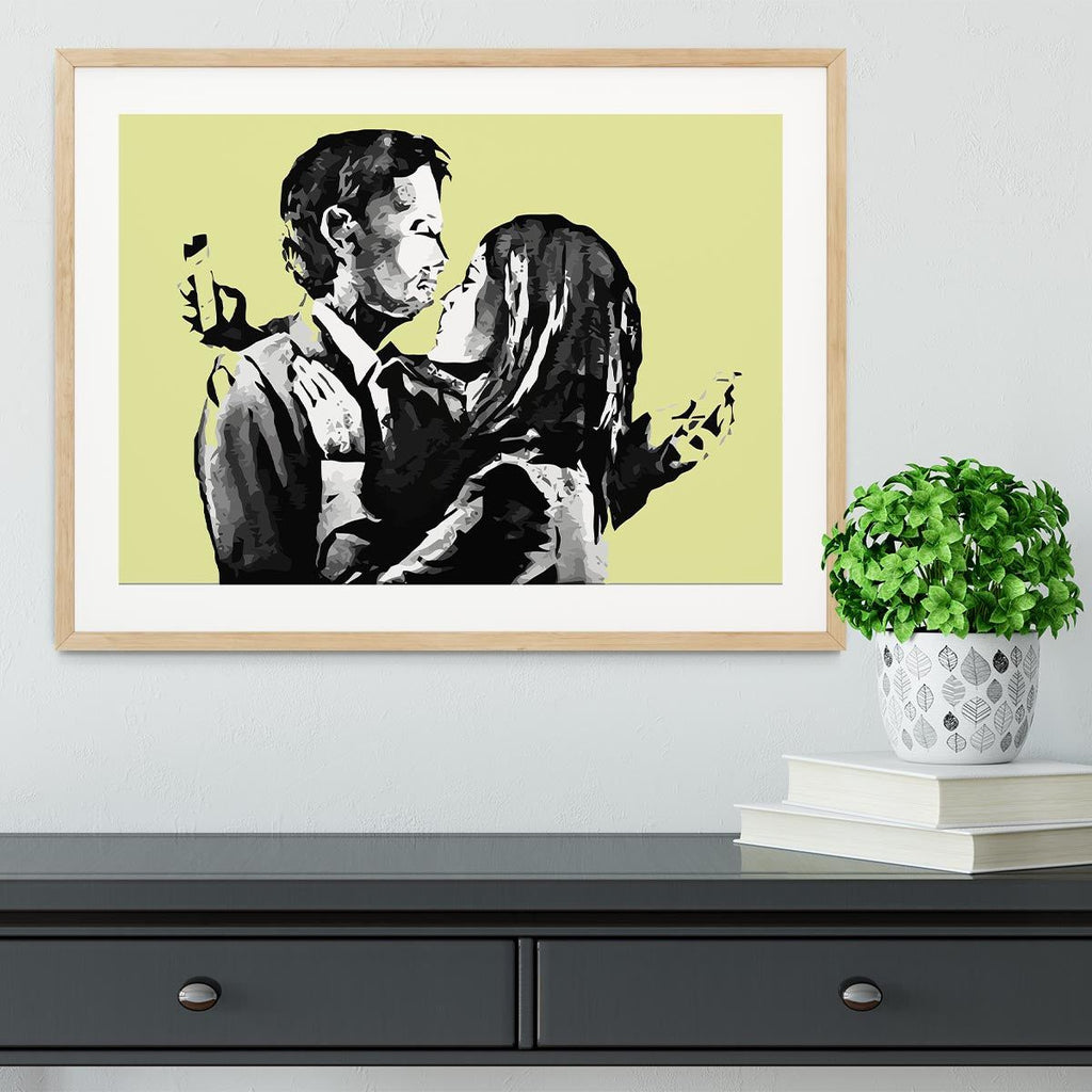 Banksy Mobile Lovers Yellow Framed Print