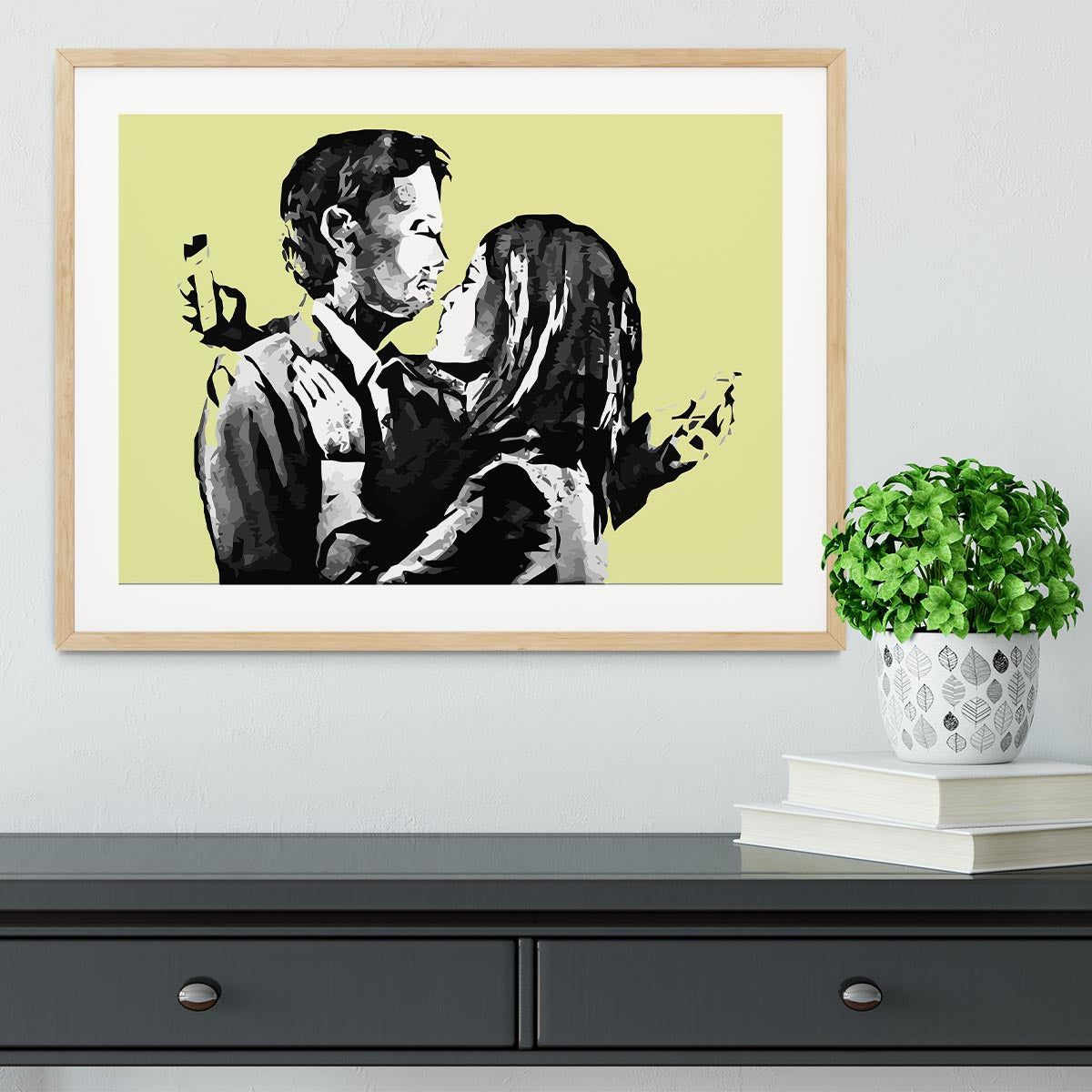 Banksy Mobile Lovers Yellow Framed Print