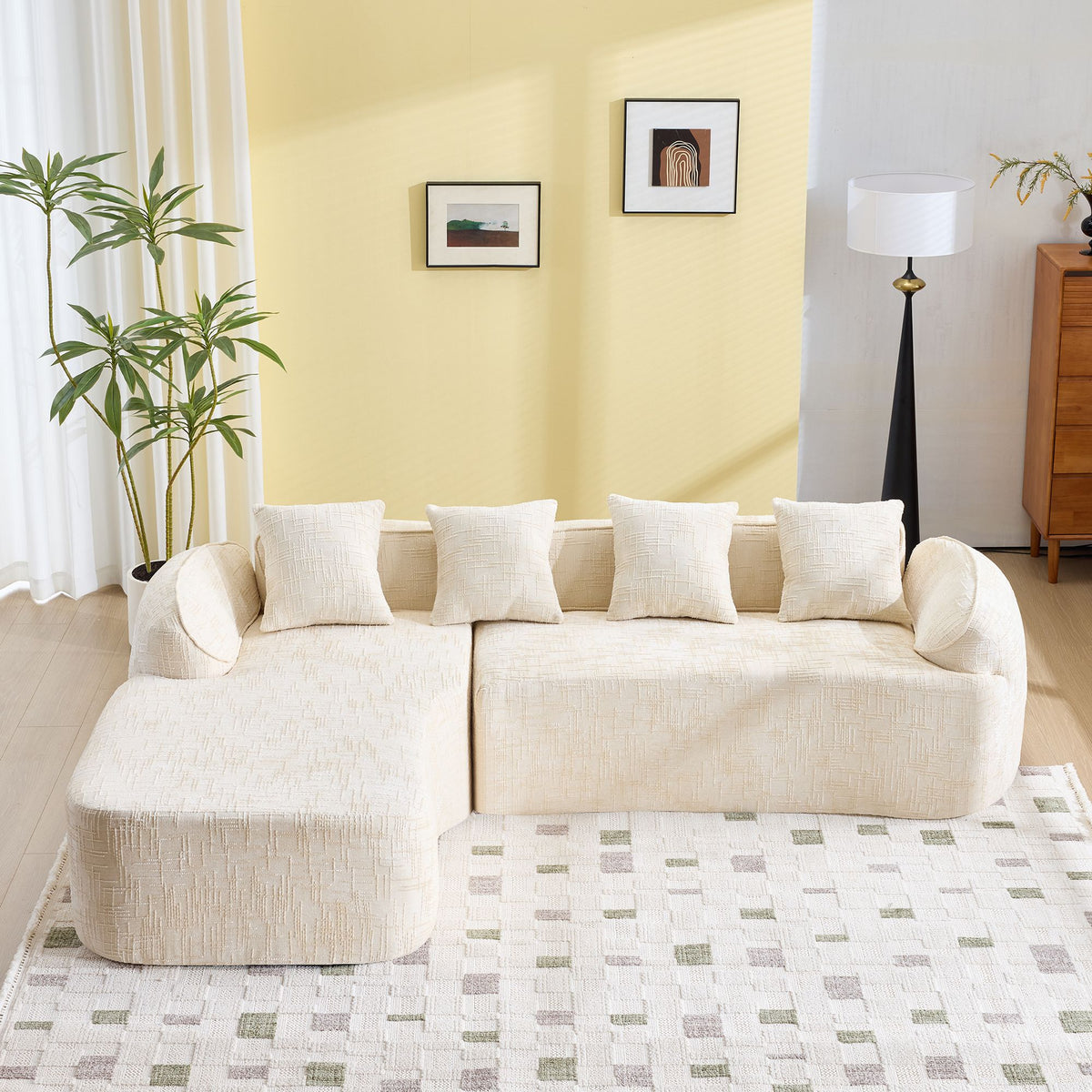 Beige L-Shaped Sofa with Curved Armrests and Throw Pillows