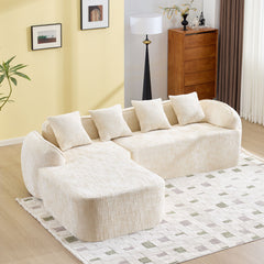 Beige L-Shaped Sofa with Curved Armrests and Throw Pillows