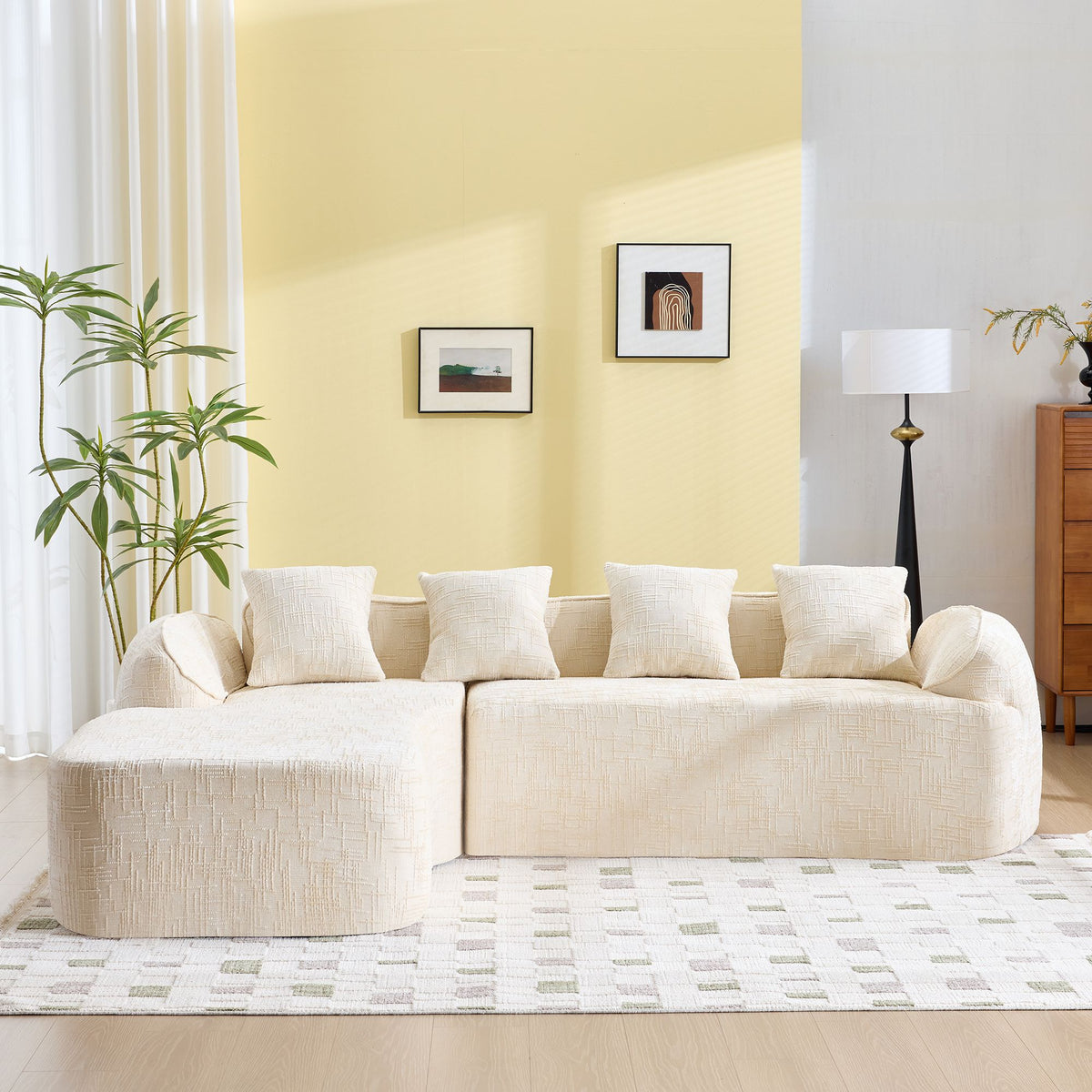 Beige L-Shaped Sofa with Curved Armrests and Throw Pillows