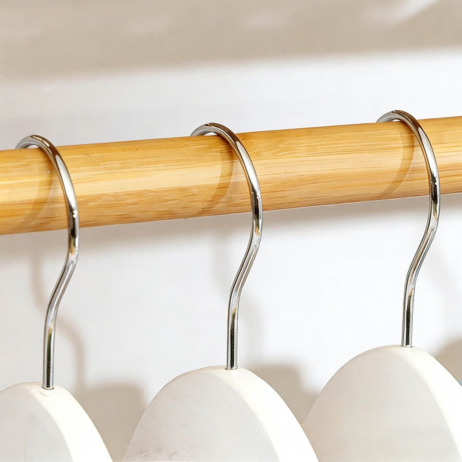 Freestanding Clothing Rack with Integrated Shoe Shelves and Hanging Rod