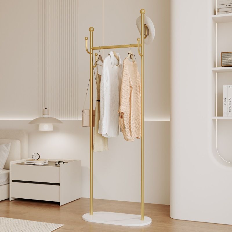 Sturdy Gold Metal Coat Rack with White Shelf and Hooks