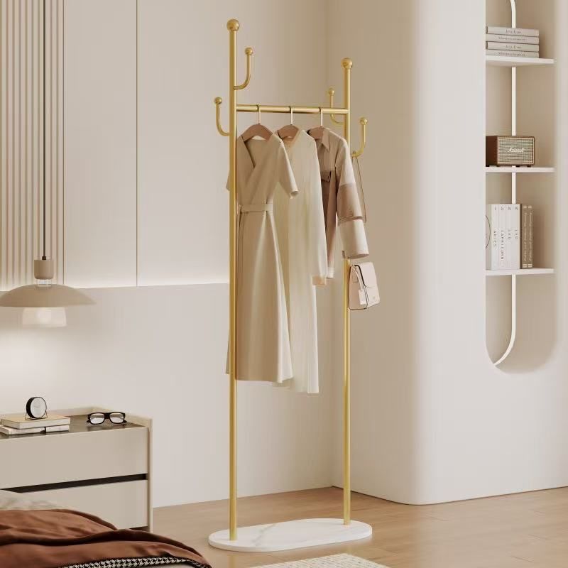 Sturdy Gold Metal Coat Rack with White Shelf and Hooks