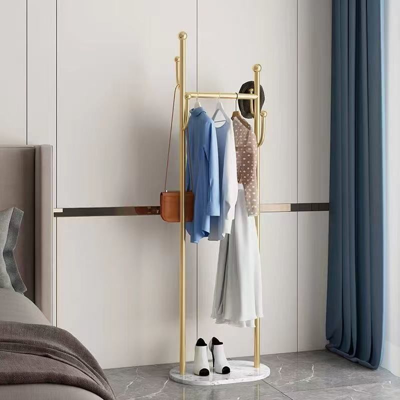 Sturdy Gold Metal Coat Rack with White Shelf and Hooks