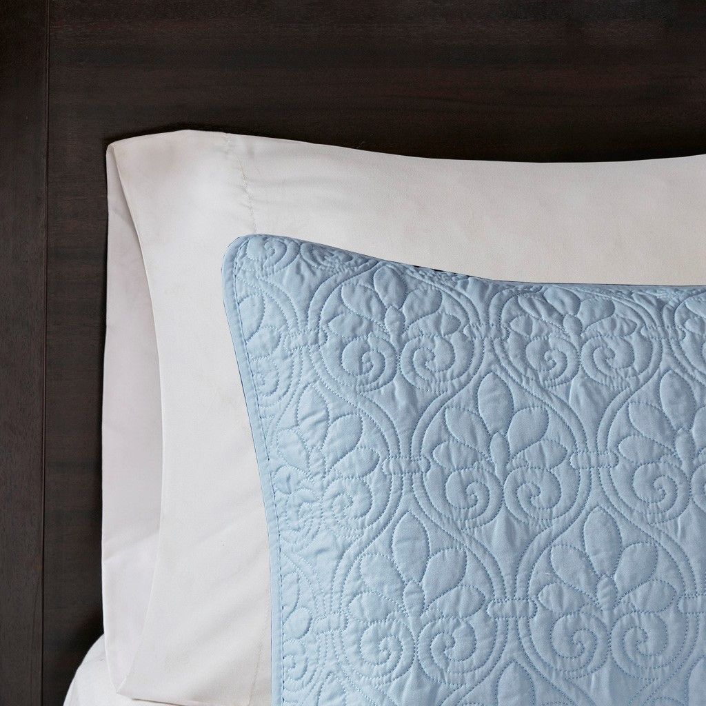 Reversible Blue Quilt Set with Classic Patterned Stitching