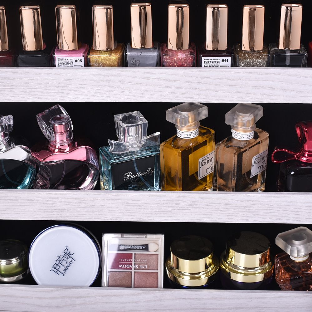 Wall-Mounted Mirrored Jewelry Cabinet With a Locking Door